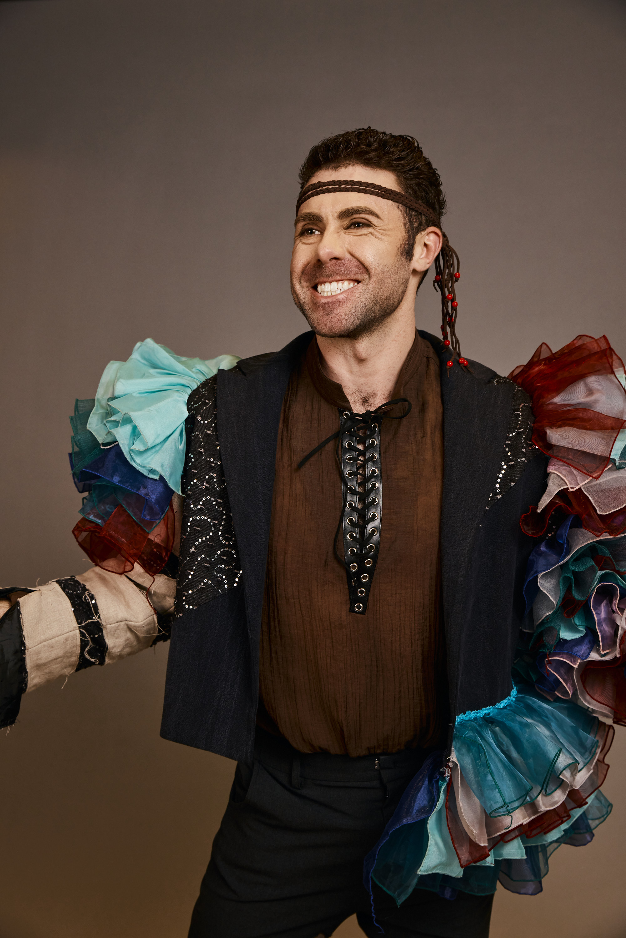 Daniel Stromfeld as Balaga — smiling